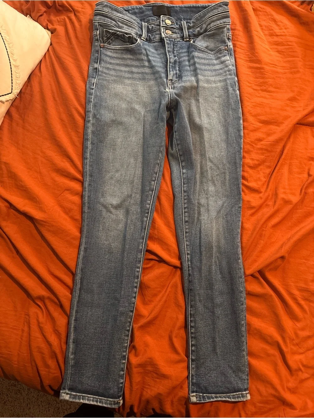 Buckle Skinny Jeans in Medium Blue Wash